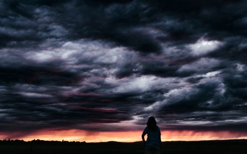 Clouds Before Storm And A Girl