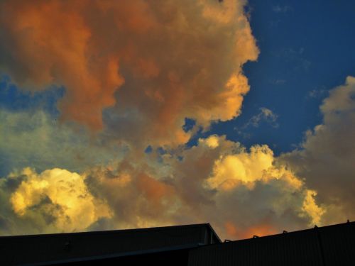 Clouds On Fire Above Roof