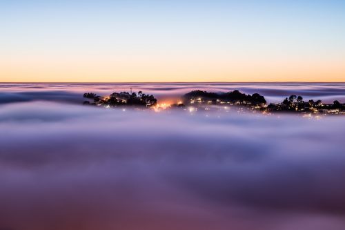 cloudscape above housing