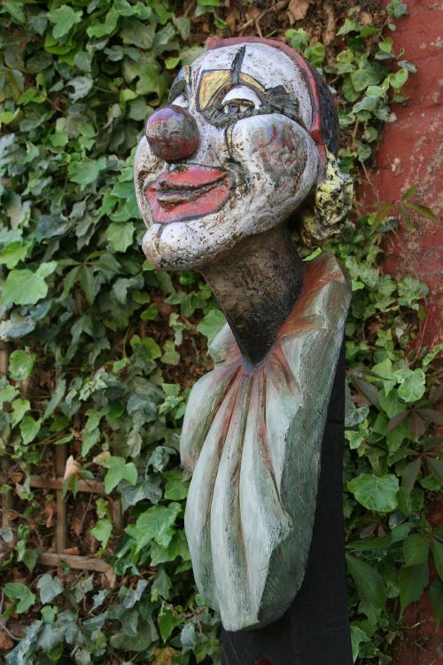 clown figure carving