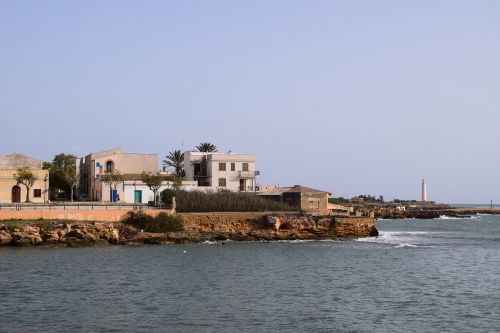 coast coastal village lighthouse