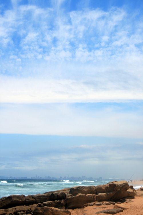 Coastline And Clouds