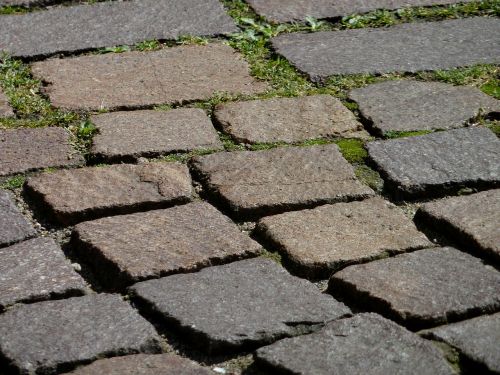 cobblestones road surface sidewalk