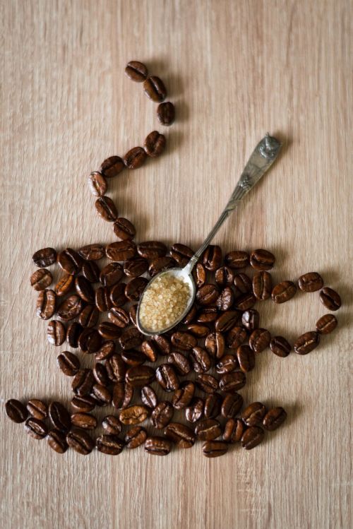 coffee beans coffee cup spoon