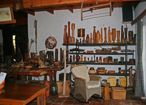 Collection Of Artifacts And Chair