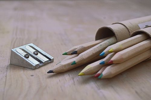 colored pencils pencil sharpener wood