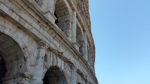 colosseum  rome  blue sky