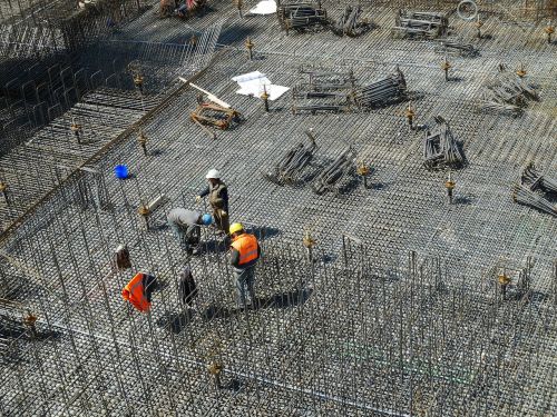 construction site construction workers building