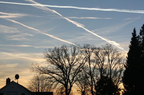 contrail evening sky aircraft