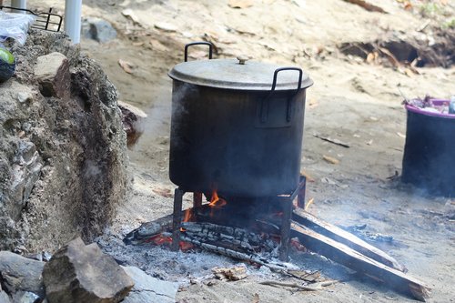 cooking pot  river  fire