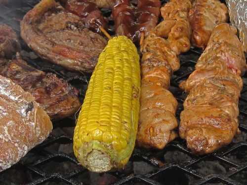 corn and meat on the fire corn yellow