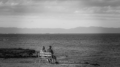 couple gazing sea