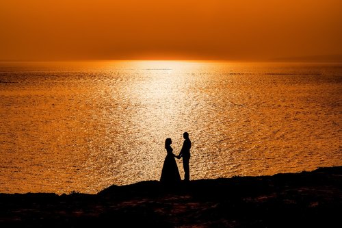 couple  sunset  sea