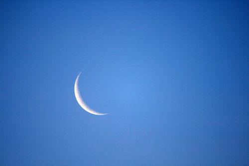 Crescent Moon In Blue Sky