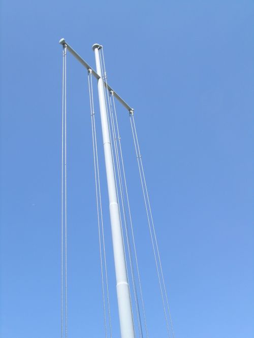 cross auction metal pole