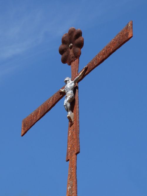 crucifix sky rusty