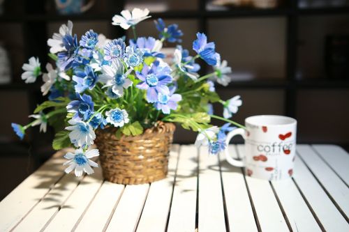 cup flowers table