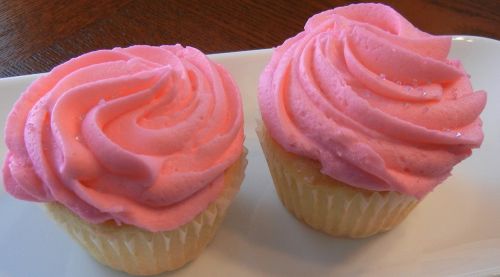 cupcakes pink frosting white cake