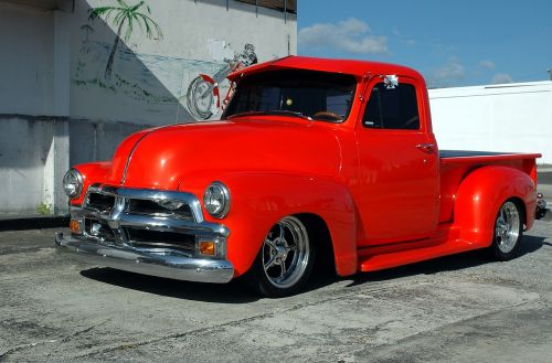 customized red pickup truck