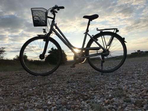 cycle beach sunset