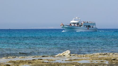 cyprus rocky coast boat