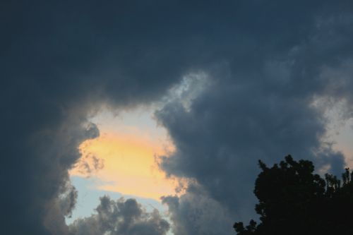 Dark Clouds At Sunset