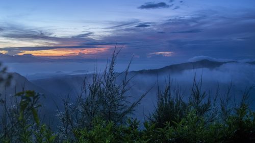 dawn mountain foggy