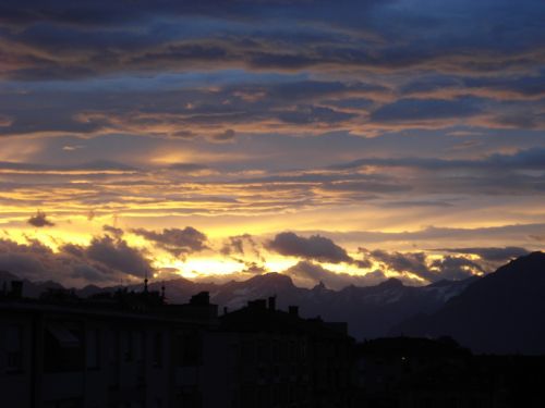 dawn rising sun clouds