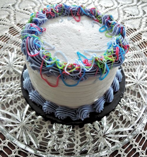 decorated white cake sweet frosting colorful