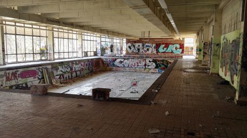demolition lapsed indoor swimming pool