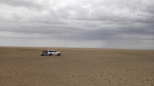 desert  dark clouds  off road buggy