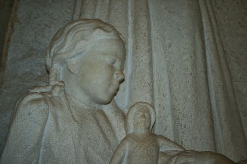 Detail Of Girls Face In Marble
