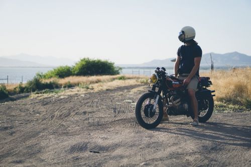 dirt road man motorcycle