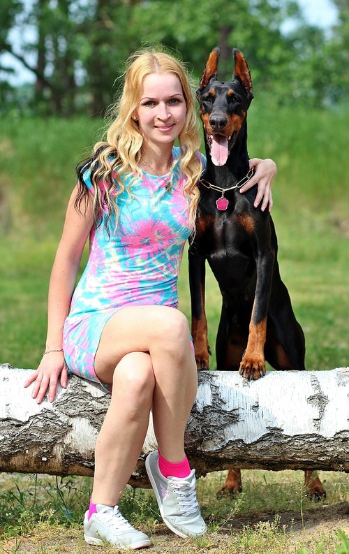 doberman  dog  blonde woman