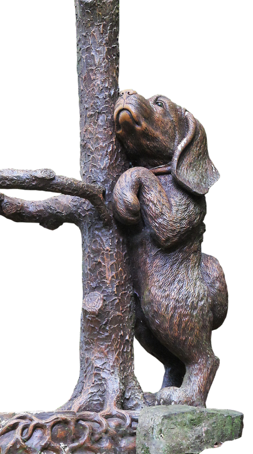 dog bronze statue tree