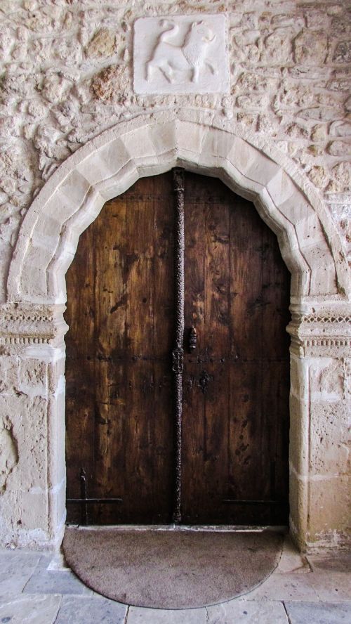 door wooden coat of arms