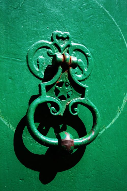 door knocker green door