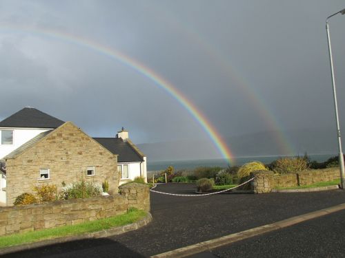 double rainbow sea weather