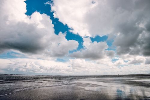 dramatic sky beach coast