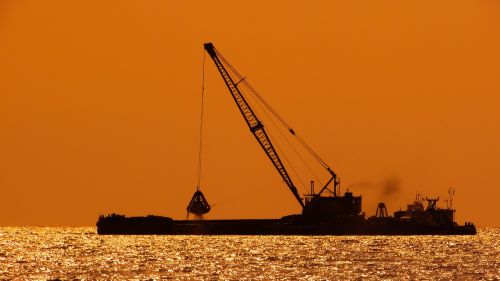 dredger floating platform sunset