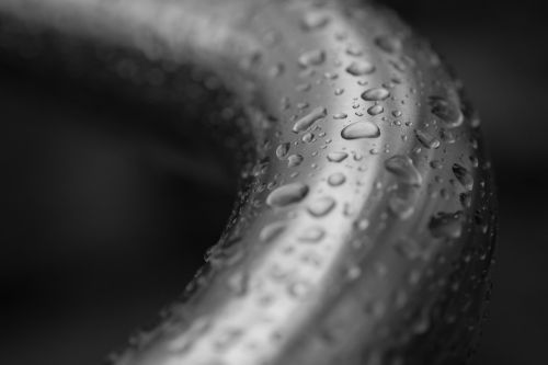drop of rain closeup handrail