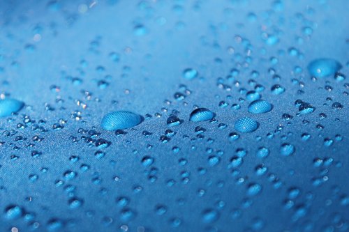drops  blue background  raindrops