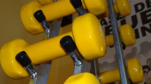 dumbbells yellow strength training