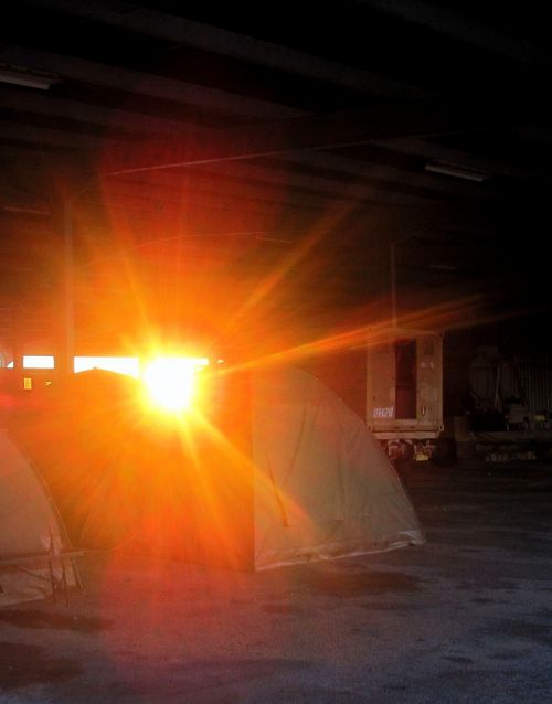 Early Sun Over Tents