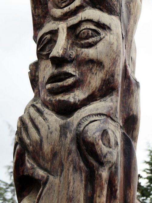 ecuador totem man with cut ear