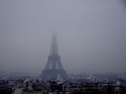 eiffel tower fog snow