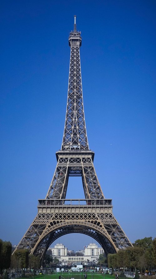 eiffel tower  paris  blue sky