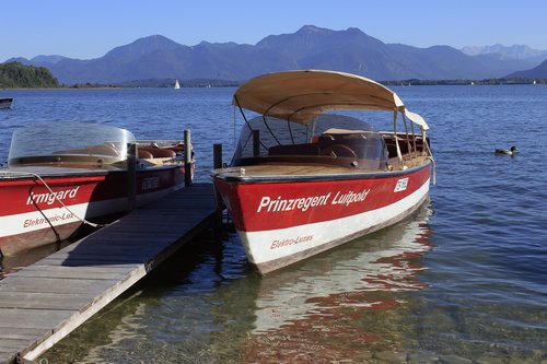 electric boat  boat  pier