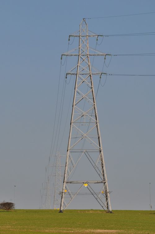 electricity pylon field electricity
