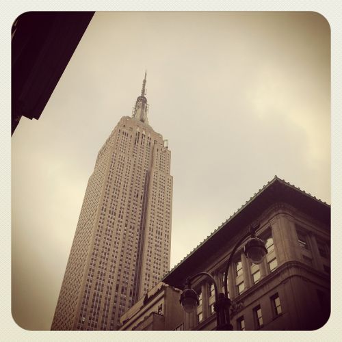 empire state building new york city cloudy day